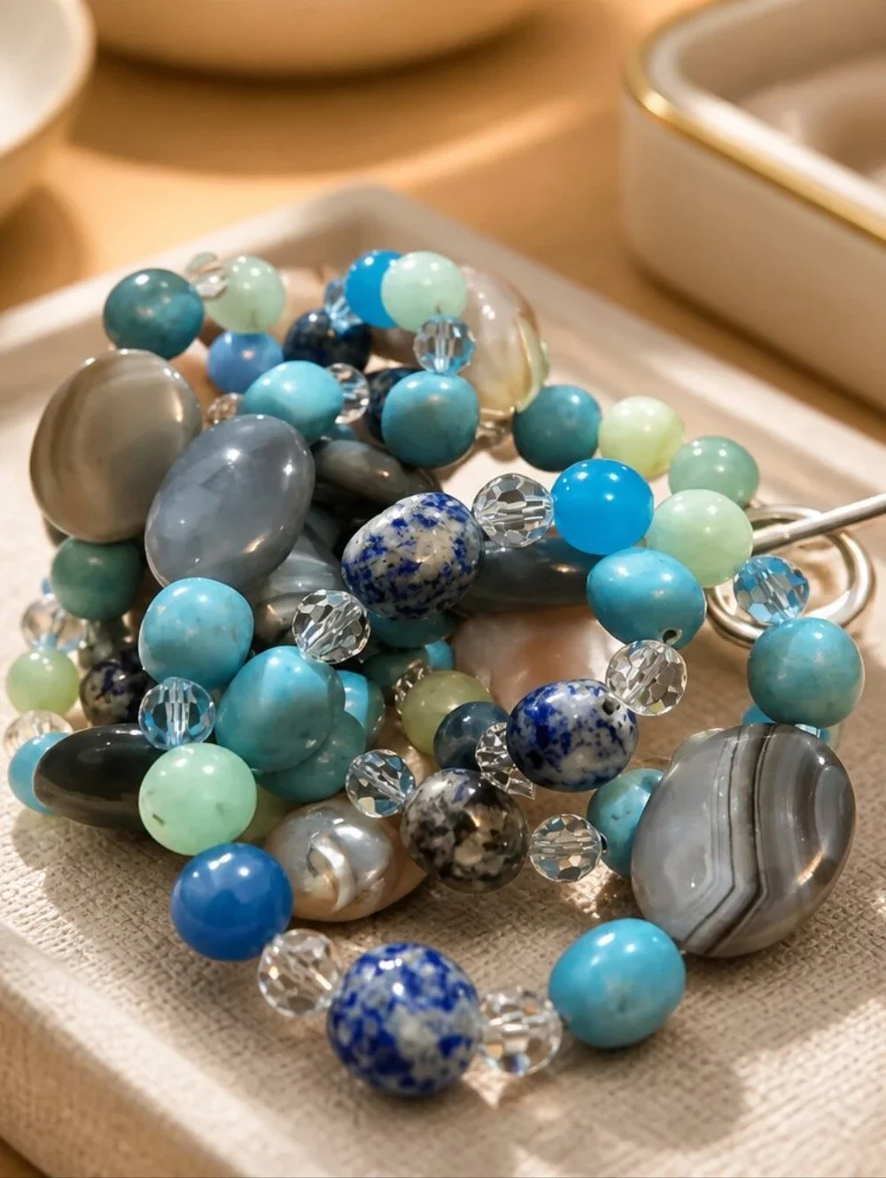This is a mixed gemstone and glass bead statement necklace